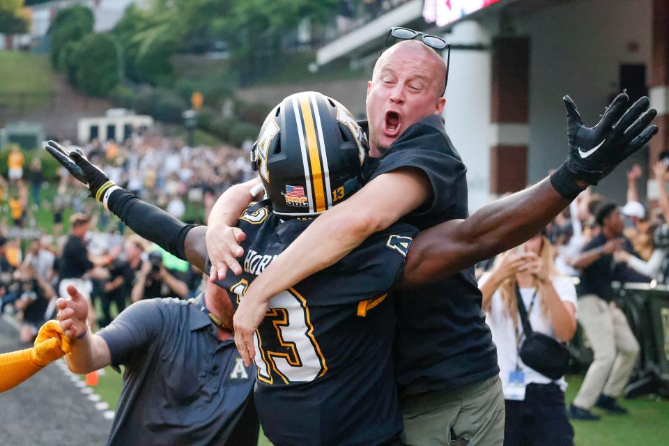 Appalachian State wide receiver Christan Horn celebrates his game-winning, Hail Mary touchdown.