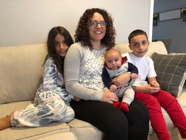 Christina Close of Hazlet with son, Cannen, 10, daughter, Ceceila 7, and son, Cade, 6 weeks. Close recently graduated from nursing school at Brookdale Community College and has several interviews lined up.