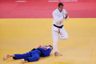 LONDON, ENGLAND - JULY 31: Antoine Valois-Fortier of Canada celebrates defeating Avtandil Tchrikishvili of Georgia (blue) Euan Burton of Great Britain in the Men's -81 kg Judo on Day 4 of the London 2012 Olympic Games at ExCeL on July 31, 2012 in London, England. (Photo by Quinn Rooney/Getty Images)