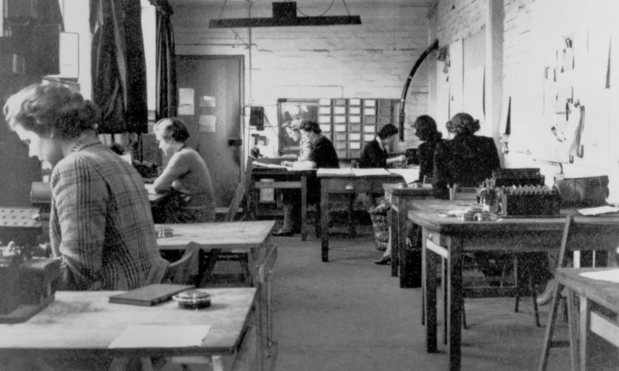<span>The machine room in Hut 6 of Bletchley Park, where staff worked on cracking the Nazis’ Enigma codes during the second world war.</span><span>Photograph: Bletchley Park Trust/SSPL/Getty Images</span>