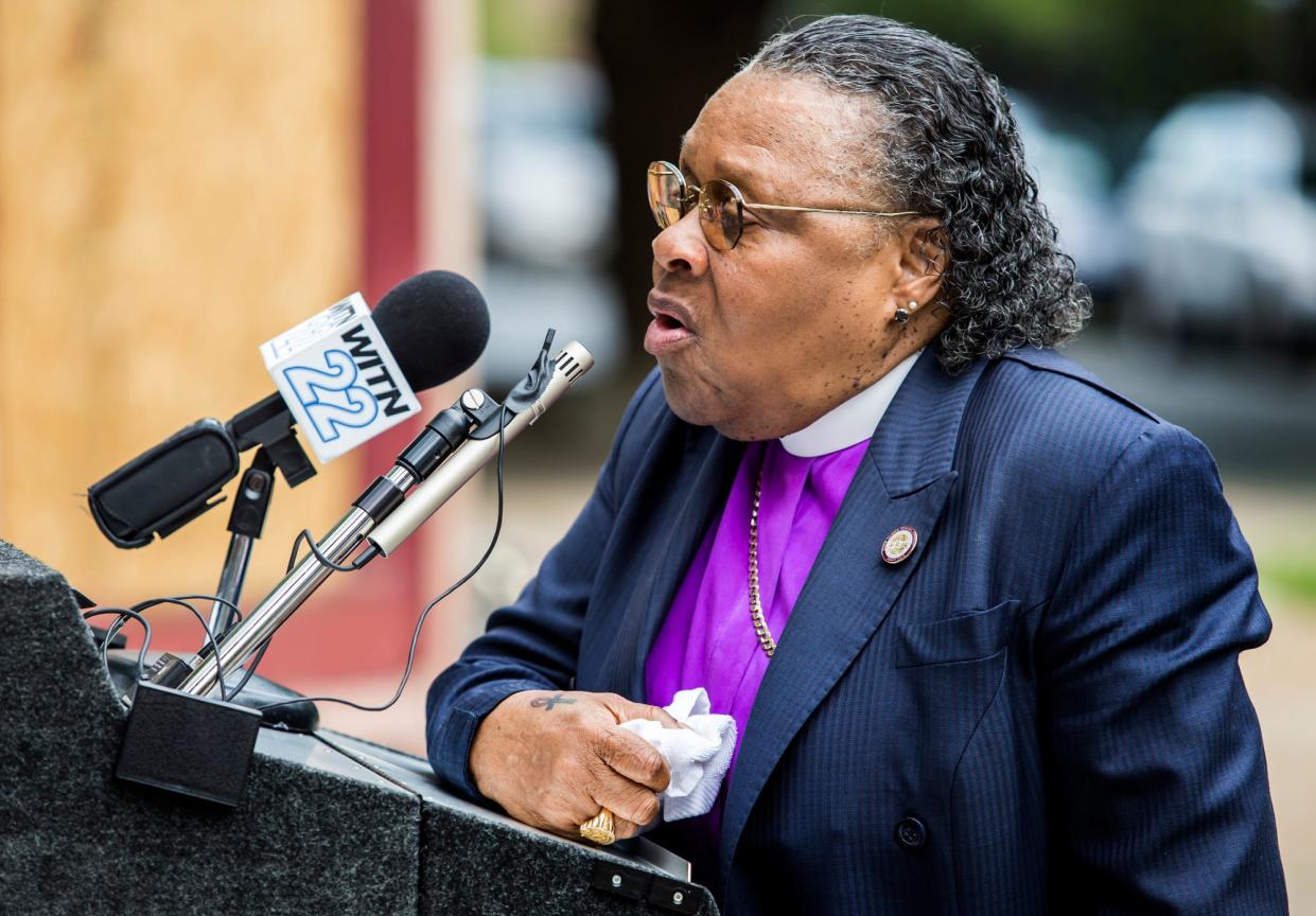 Bishop Aretha Morton speaks at a ceremony honoring her outside the Tabernacle Full Gospel Baptist Church in Wilmington on Sunday afternoon.