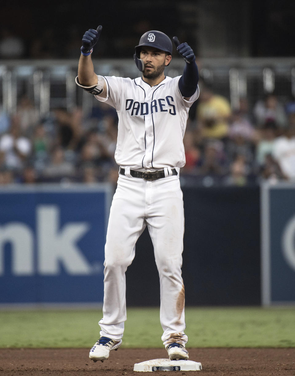 San Diego Padres' Eric Hosmer celebrates his RBI double during the fifth inning of a baseball game against the Arizona Diamondbacks in San Diego, Saturday, Aug. 18, 2018. (AP Photo/Kyusung Gong)