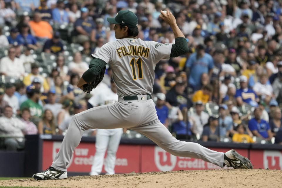 Oakland Athletics relief pitcher Shintaro Fujinami throws during the ninth inning of a baseball game against the Milwaukee Brewers Saturday, June 10, 2023, in Milwaukee. (AP Photo/Morry Gash)