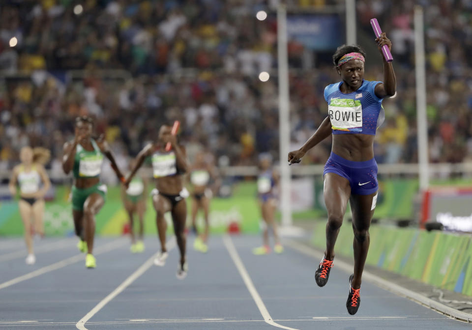 FILE - United States's Tori Bowie crosses the line to win the gold medal in the women's 4x100-meter relay final during the athletics competitions of the 2016 Summer Olympics at the Olympic stadium in Rio de Janeiro, Brazil, Friday, Aug. 19, 2016. Tori Bowie, the sprinter who won three Olympic medals at the 2016 Rio de Janeiro Games, has died, her management company and USA Track and Field said Wednesday, May 3, 2023. Bowie was 32. She was found Tuesday in her Florida home. No cause of death was given. (AP Photo/David J. Phillip, File)