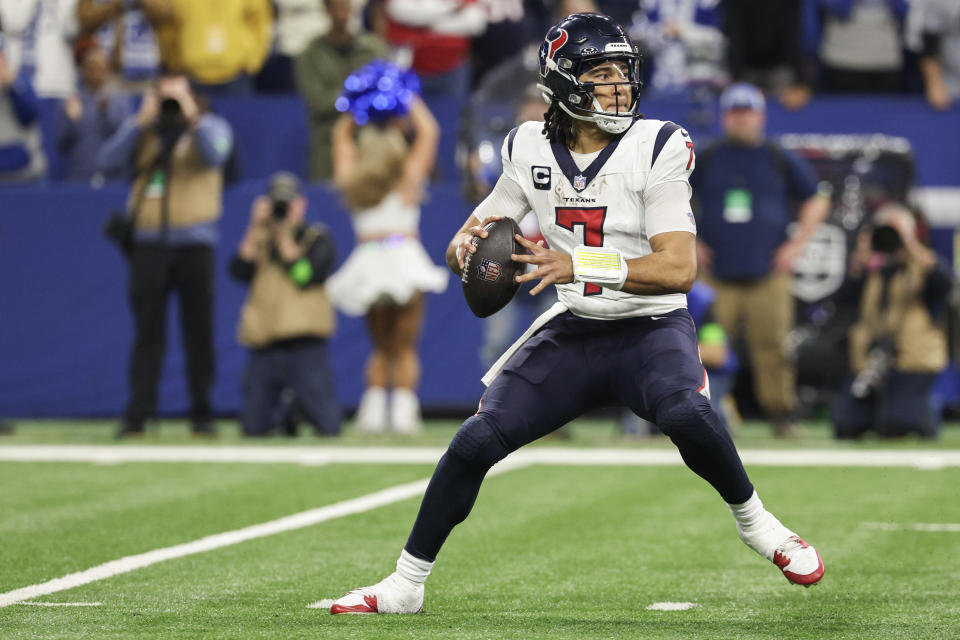 INDIANAPOLIS, INDIANA - JANUARY 06: C.J. Stroud #7 of the Houston Texans looks to pass during the fourth quarter against the Indianapolis Colts at Lucas Oil Stadium on January 06, 2024 in Indianapolis, Indiana. (Photo by Michael Hickey/Getty Images)