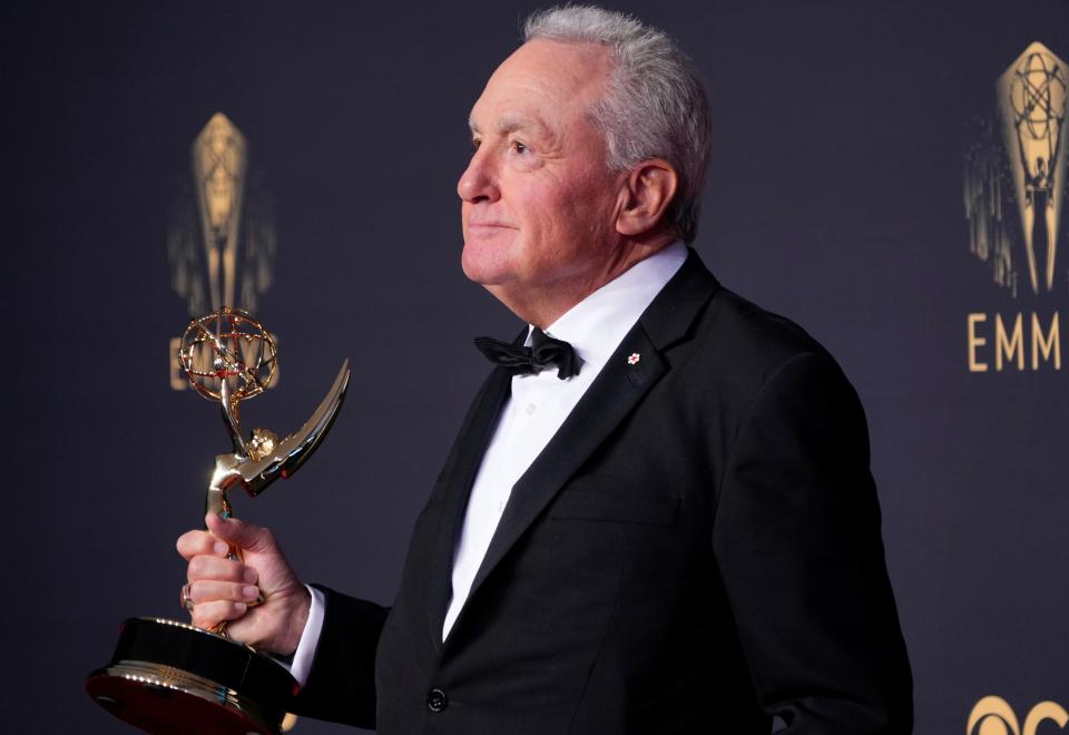 "Saturday Night Live" executive producer Lorne Michaels shows off the Emmy the long-running late-night program picked up in the variety-sketch series category Sunday. It was the fifth consecutive win in that category for "SNL."