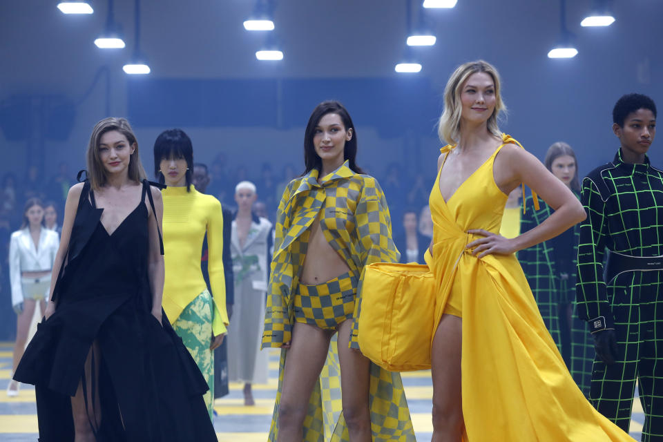 Models Gigi Hadid, from left, Bella Hadid and Karlie Kloss wear creations as part of the Off-White ready to wear Fall-Winter 2019-2020 collection, that was presented in Paris, Thursday, Feb. 28, 2019. (AP Photo/Thibault Camus)