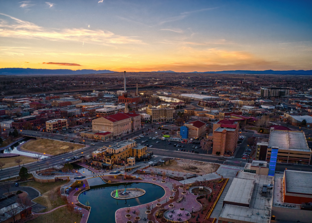 Aerial view of a city at sunset.