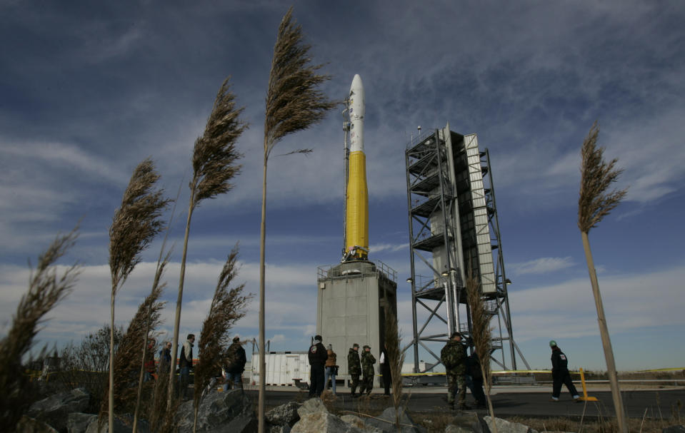 FILE - In a Saturday Dec. 9, 2006 file photo, the Orbital Science Corp Minotaur 1 rocket sits on its launch pad at NASA's Wallops Flight Facility in Wallops Island, Va. Orbital Sciences is set to conduct a test launch of its Antares rocket under a NASA program where private companies deliver supplies to the International Space Station. (AP Photo/Steve Helber, File)