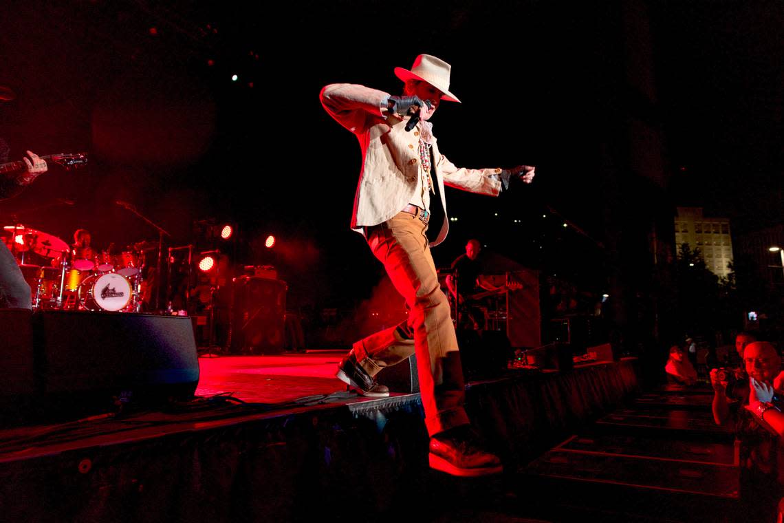 Perry Farrell jumps down onto a speaker in the pit as Jane’s Addiction performs at Raleigh, N.C.’s Red Hat Amphitheater, Tuesday night, Sept. 3, 2024.