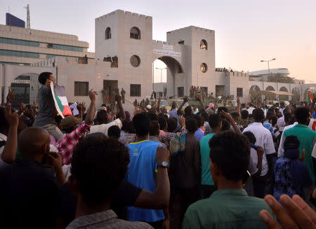 Sudanese demonstrators chant slogans as they attend a protest rally demanding Sudanese President Omar Al-Bashir to step down, outside Defence Ministry in Khartoum, Sudan April 9, 2019. REUTERS/Stringer