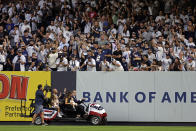 CORRECTS THAT JETER WAS INDUCTED IN 2021, NOT THIS YEAR - Baseball Hall of Famer Derek Jeter waves to fans during a ceremony honoring his induction in 2021, before a baseball game between the Tampa Bay Rays and the New York Yankees on Friday, Sept. 9, 2022, in New York. (AP Photo/Adam Hunger)
