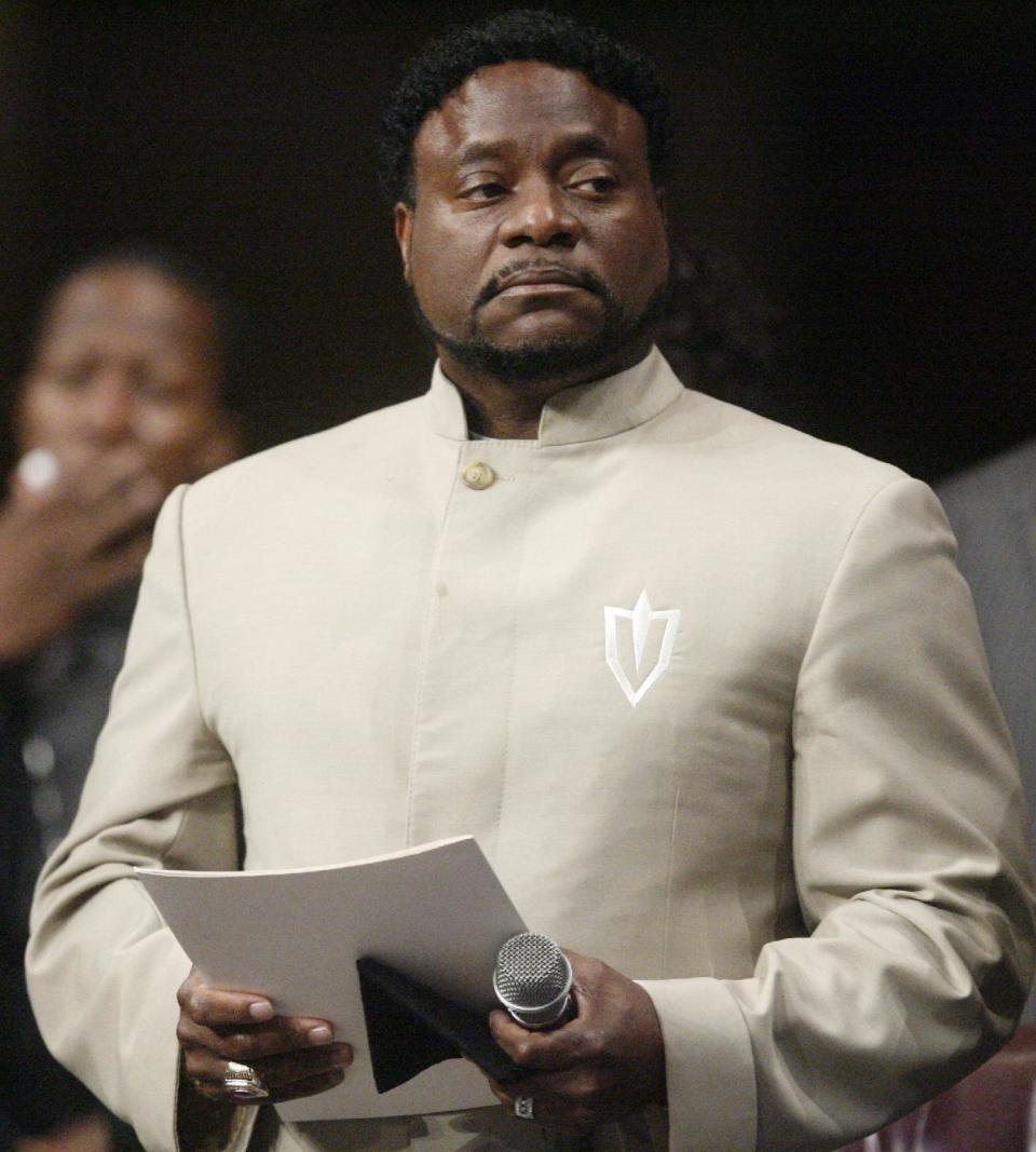 FILE - In a Sunday, Sept. 26, 2010 file photo, Bishop Eddie Long prepares to speak, at New Birth Missionary Baptist Church near Atlanta. Long, a prominent pastor who led one of metro Atlanta's largest churches, died Sunday, Jan. 15, 2017, the New Birth Missionary Baptist Church said in a statement to local media outlets. He was 63. (AP Photo/John Amis, Pool, File)