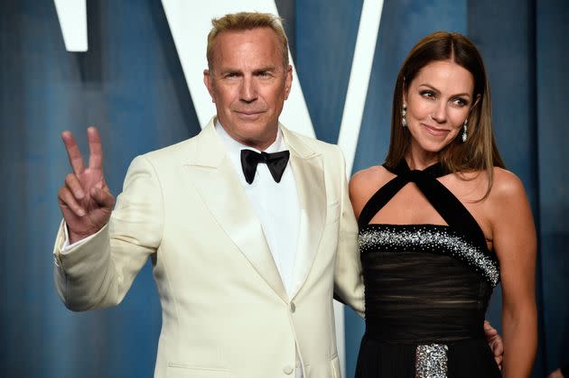 Actor Kevin Costner and Christine Baumgartner attend the 2022 Vanity Fair Oscar Party on March 27, 2022, in Beverly Hills.