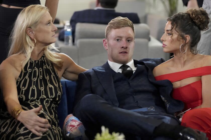 Kentucky quarterback Will Levis waits in the green room with family