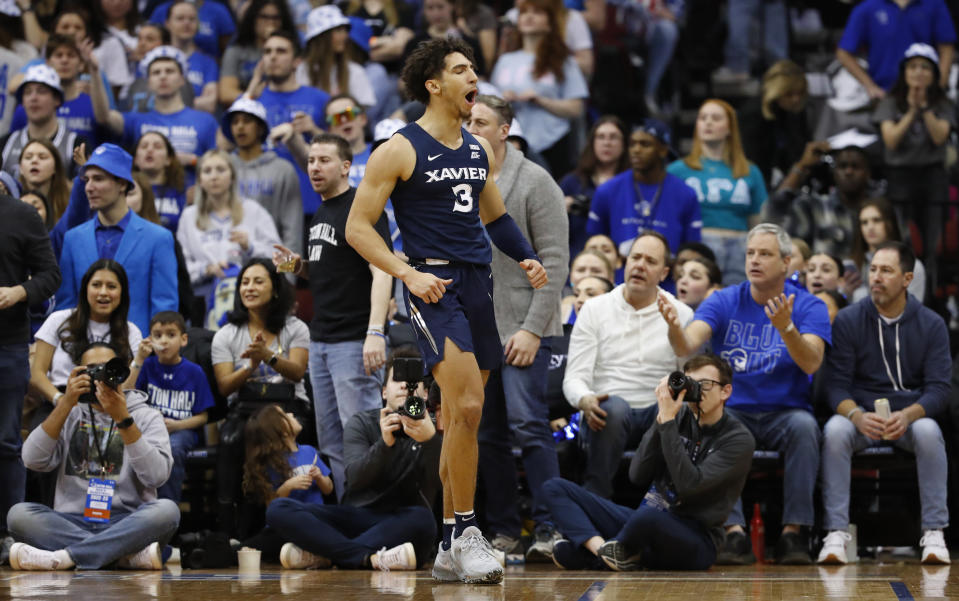 Xavier guard Colby Jones (3) reacts after scoring against Seton Hall during the second half of an NCAA college basketball game in Newark, N.J., Friday, Feb. 24, 2023. (AP Photo/Noah K. Murray)