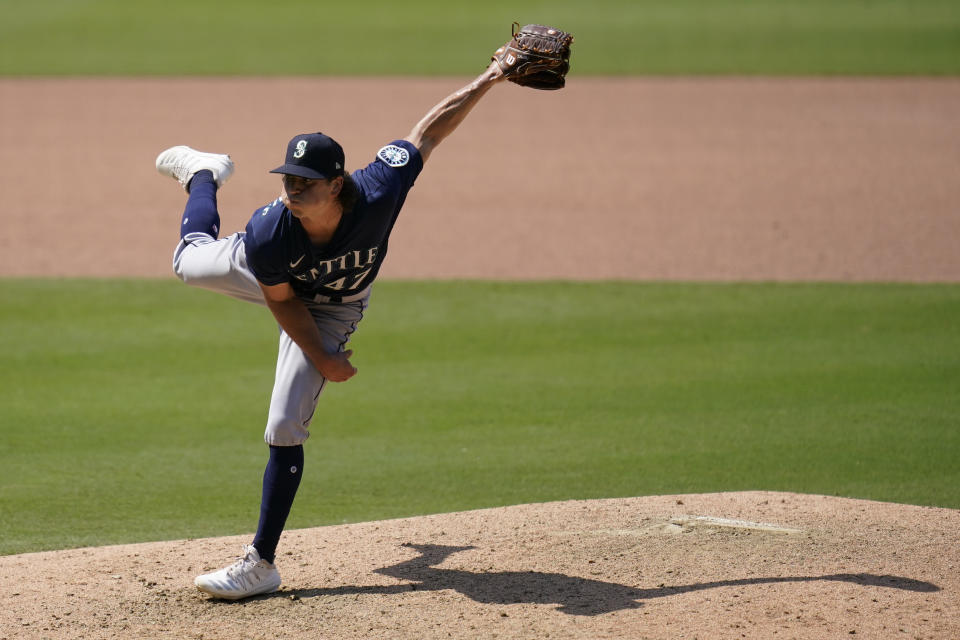 Seattle Mariners relief pitcher Taylor Williams works against a San Diego Padres batter during the seventh inning of a baseball game Thursday, Aug. 27, 2020, in San Diego. (AP Photo/Gregory Bull)