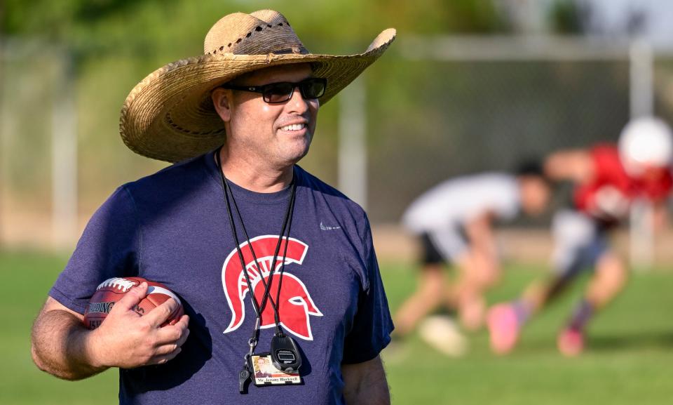 Head Football Coach Jeromy Blackwell works with his team on Wednesday, July 26, 2023 at Strathmore High School. Blackwell has returned to the job he loves and is still recovering after a life-threatening health scare that put him in the hospital for two weeks in June.