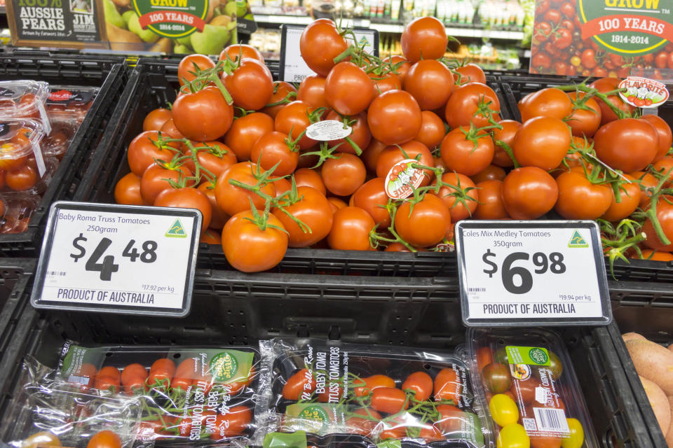 A tomato display at a Coles supermarket in Melbourne as the cost of living rises.