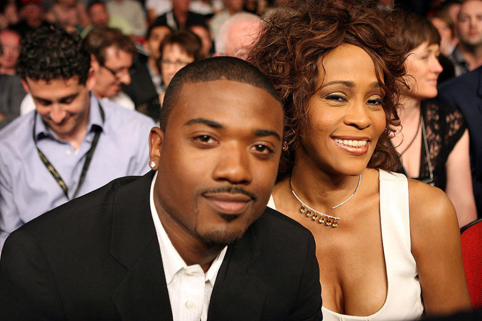 ray j and whitney sitting together at a boxing event