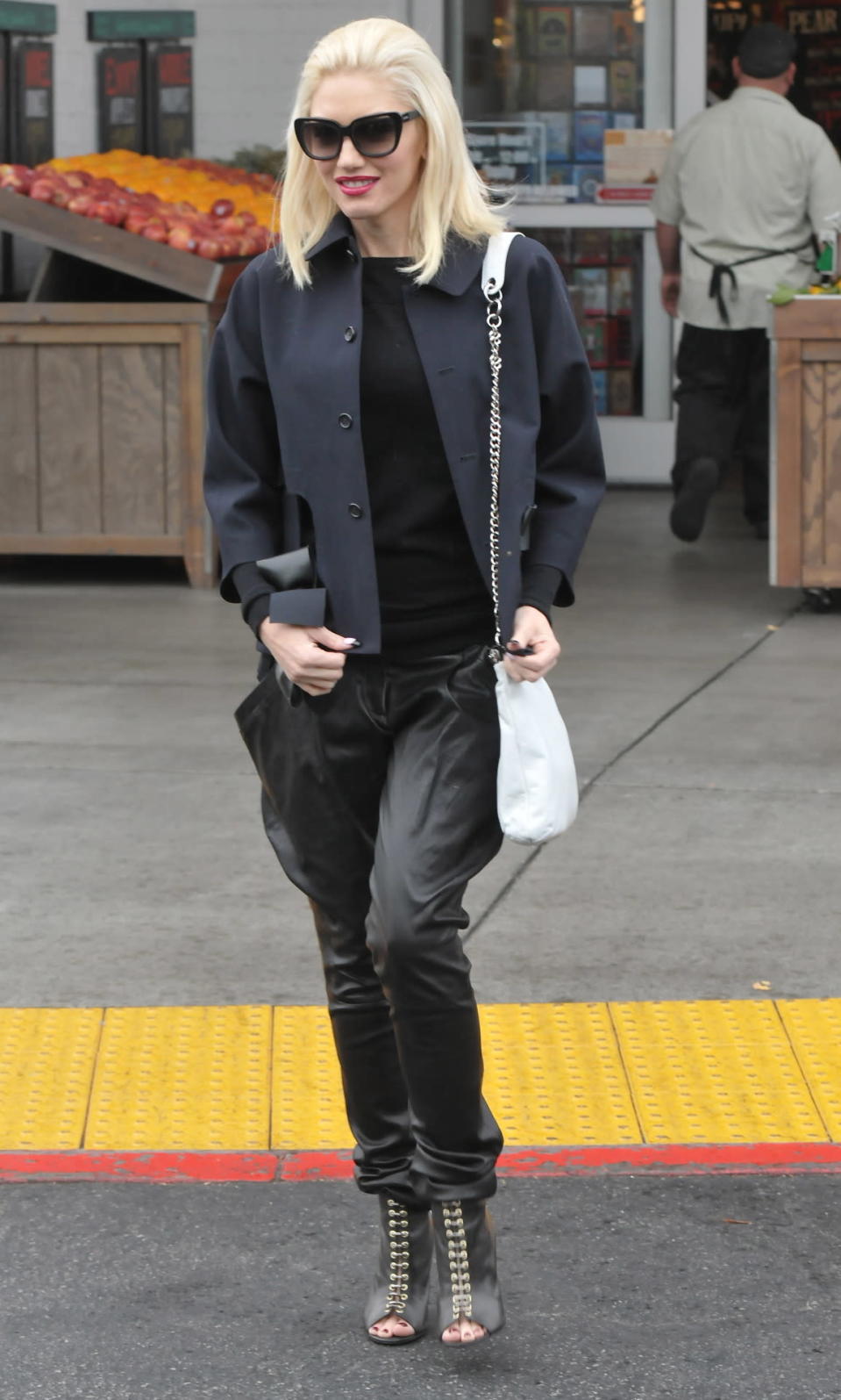 Gwen Stefani in black baggy pants and a navy jacket in Los Angeles, Calif.