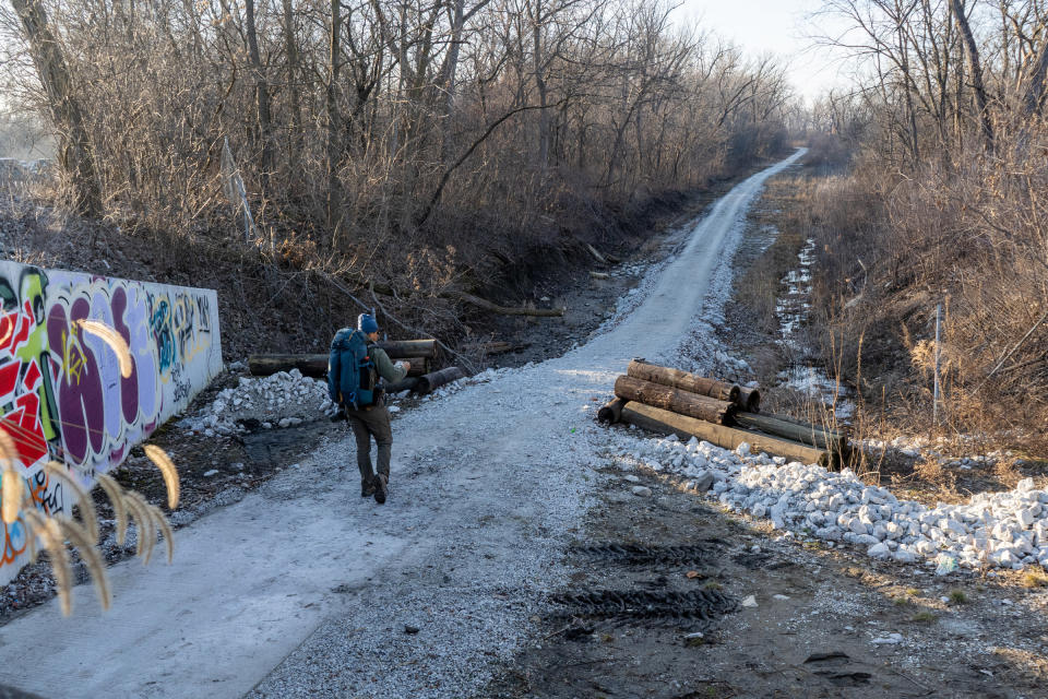 Hiker going out to fly a drone- drone law