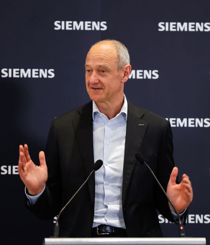 Siemens CEO Roland Busch announces their plans for a new Singapore plant, at their office in Singapore