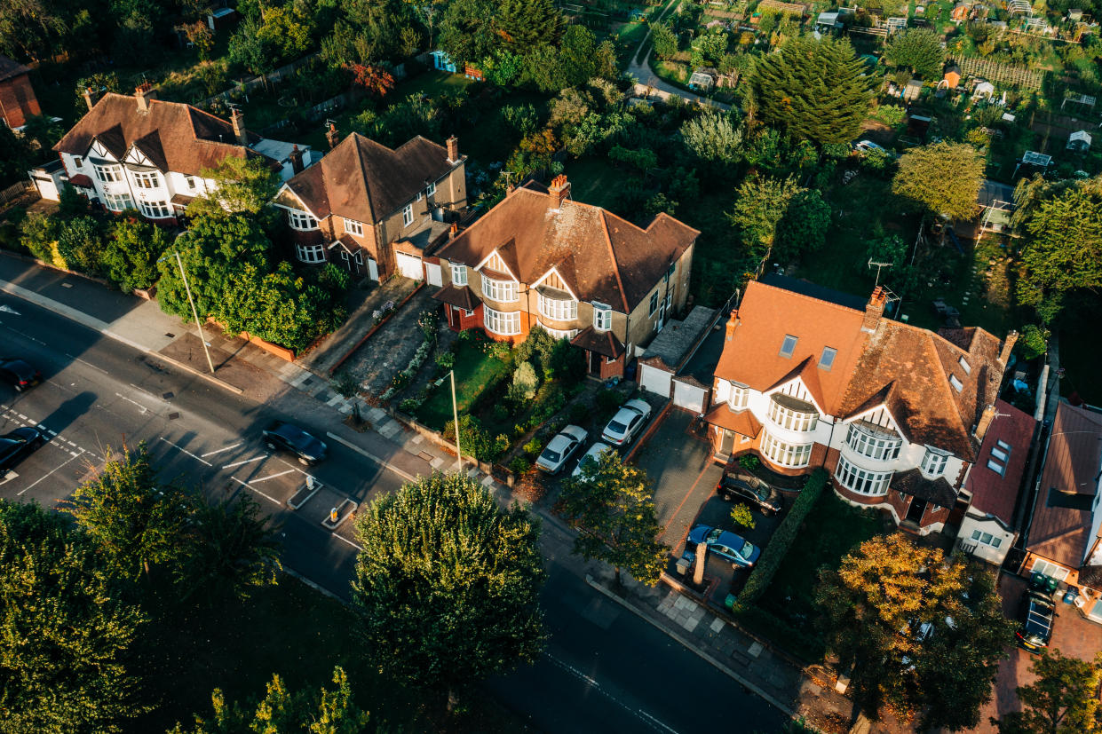 A sunset view of houses on a London street