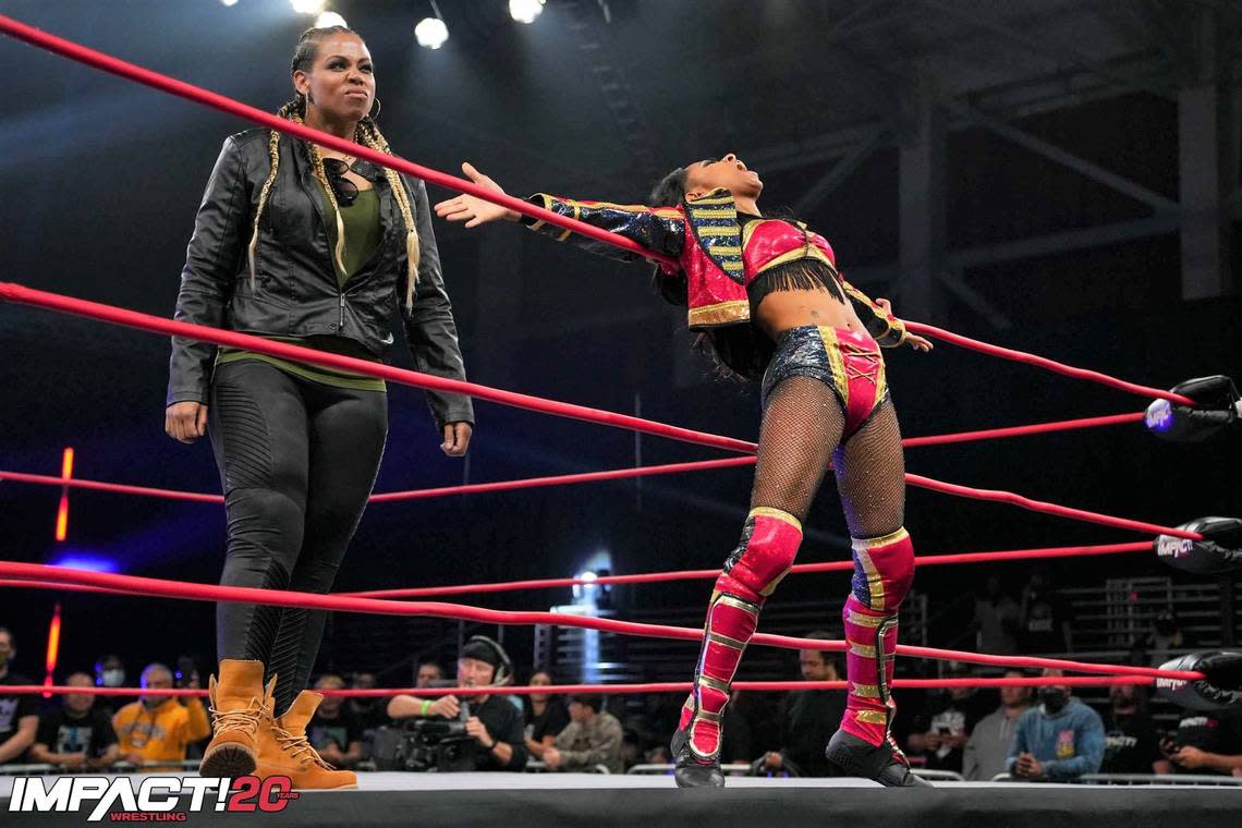 Tasha Steelz with Savannah Evans (left) during an Impact Wrestling show on AXS TV.