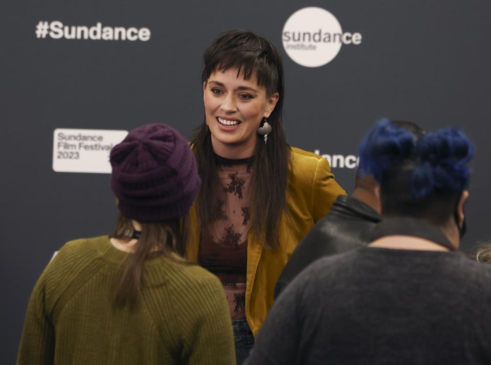 Director Alexandria Bombach speaks to reporters at the premiere of “It’s Only Life After All” at the Ray Theatre in Park City on Thursday, Jan. 19, 2023. Bombach’s documentary tells the story of the folk rock duo, Indigo Girls. | Laura Seitz, Deseret News