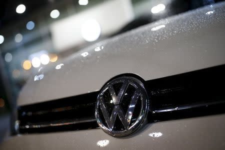 A logo of Volkswagen is seen on a Golf car parked at a dealership in Seoul, South Korea, November 25, 2015. Picture taken November 25, 2015. REUTERS/Kim Hong-Ji