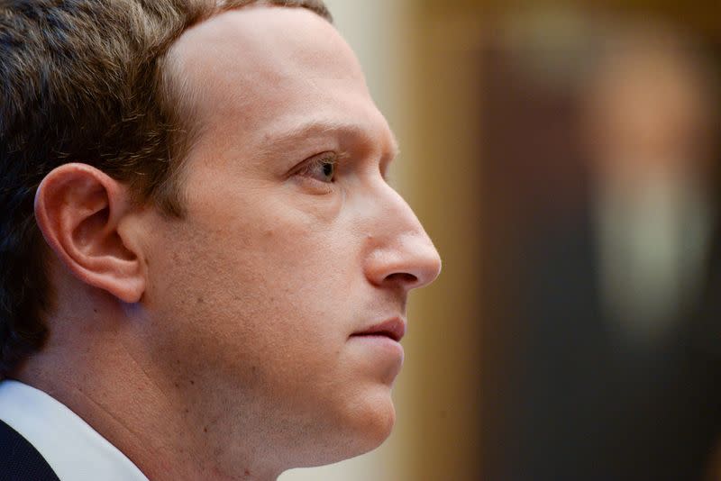 FILE PHOTO: Facebook Chairman and CEO Zuckerberg testifies at a House Financial Services Committee hearing in Washington