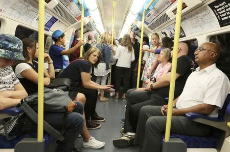 People travel on the London underground in London, Britain August 5, 2015. REUTERS/Paul Hackett