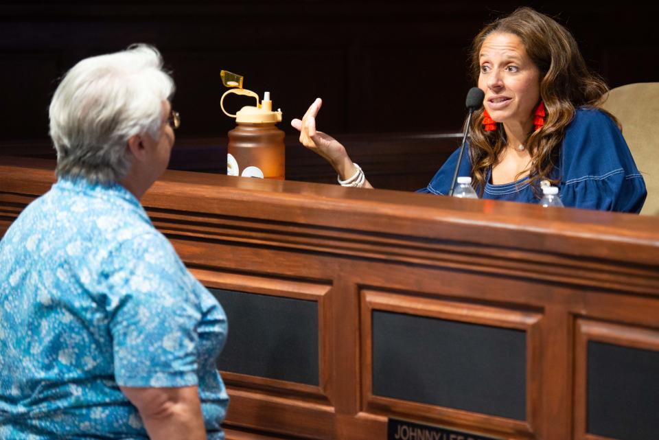 Newly elected Jackson City Council member Candice Busby talks with an attendee during the Jackson City Council meeting inside Jackson City Hall on Thursday, July 6, 2023.