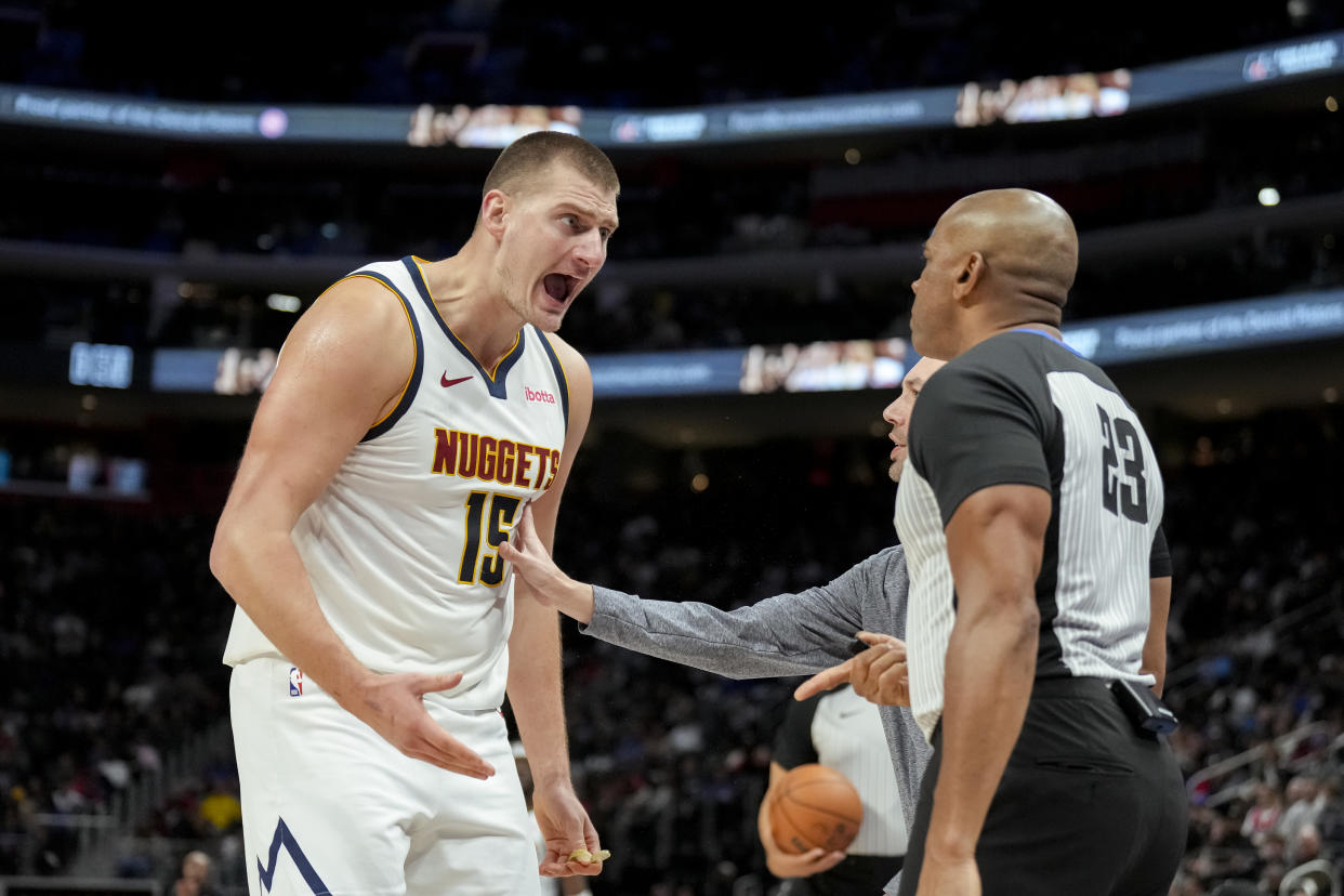 Denver Nuggets center Nikola Jokić reacts toward referee Tre Maddox and is ejected during the second quarter against the Detroit Pistons at Little Caesars Arena in Detroit, on Nov. 20, 2023. (Photo by Nic Antaya/Getty Images)