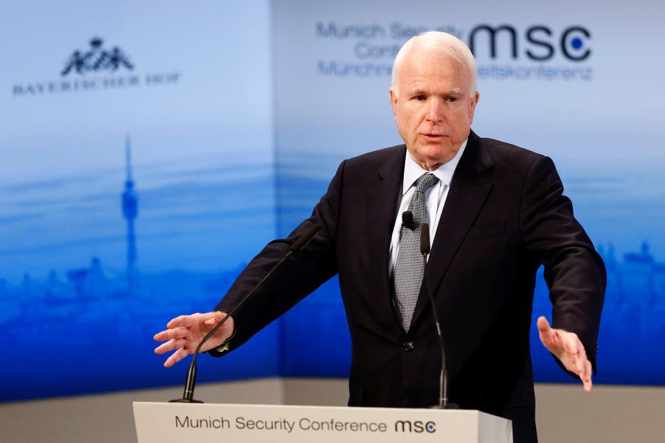 U.S. Sen. John McCain gestures during his speech at the 2016 Munich Security Conference.