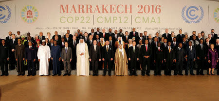 World leaders pose for a family photo at the UN Climate Change Conference 2016 (COP22) in Marrakech, Morocco November 15, 2016. REUTERS/Youssef Boudlal