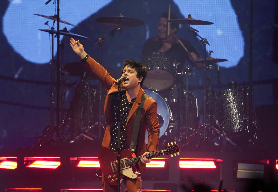 Billie Joe Armstrong, center, and Tre' Cool of Green Day perform on day three of the Bud Light Super Bowl Music Fest, Saturday, Feb. 12, 2022, at Crypto.com Arena in Los Angeles. (AP Photo/Chris Pizzello)