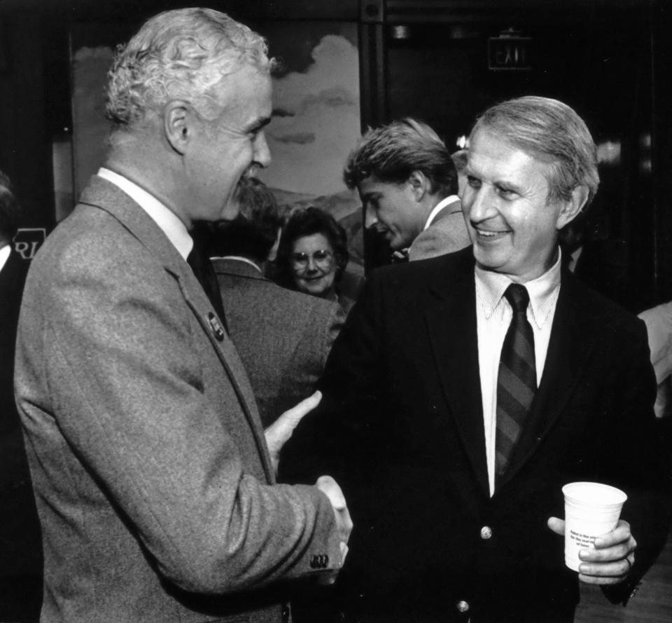 Gov. Tony Earl, right, chats with Rep. Jim Moody in October 1986.