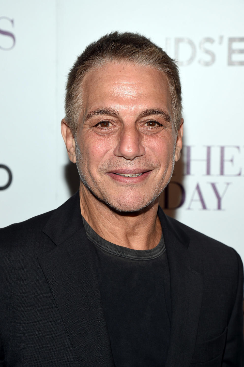 Tony Danza smiles