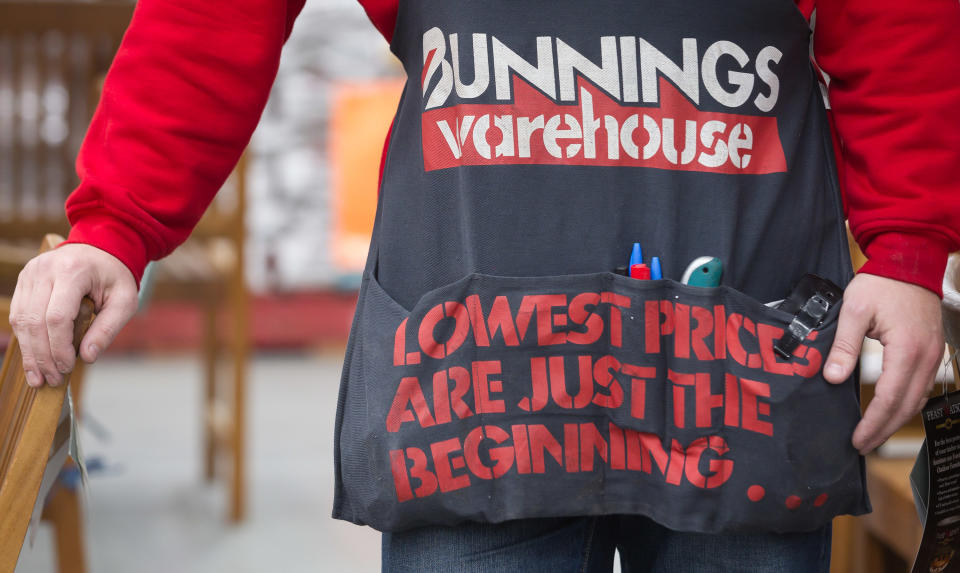 Worker wearing a Bunnings apron