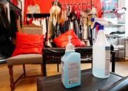 A view shows bottles containing disinfectant in the show room of Ukrainian fashion designer Frolov in Kiev