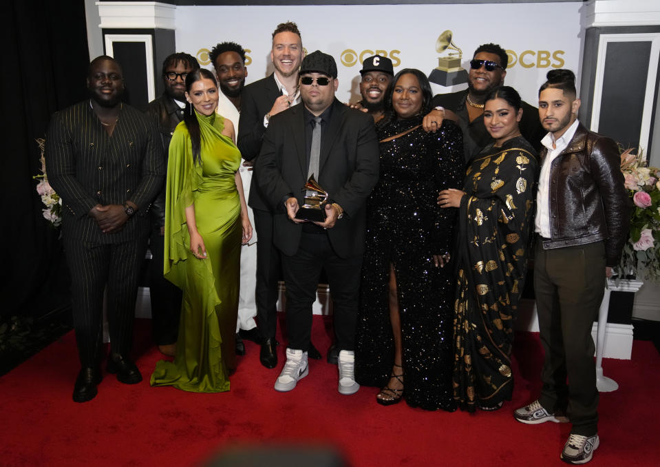 FILE - Elevation Worship and Maverick City Music, winners of the award for best contemporary christian music album for "Old Church Basement," pose in the press room at the 64th Annual Grammy Awards at the MGM Grand Garden Arena on Sunday, April 3, 2022, in Las Vegas. A new study found that Elevation and a handful of other megachurches have cornered the market on worship music in recent years, dominating the worship charts. (AP Photo/John Locher, File)