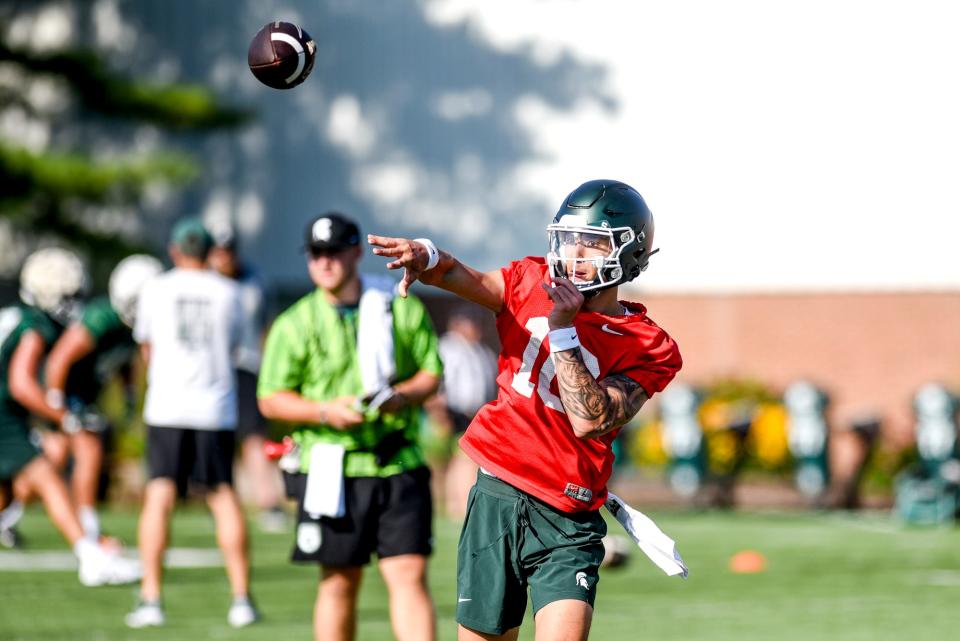 Michigan State's Noah Kim throws a pass during the opening day of MSU's football fall camp on Thursday, Aug. 3, 2023, in East Lansing.
