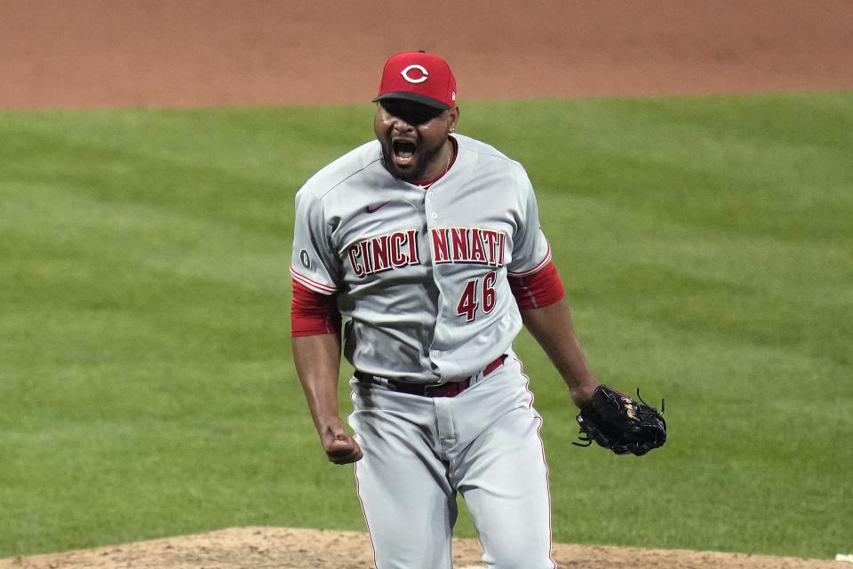 Cincinnati Reds pitcher Michael Feliz celebrates after striking out St. Louis Cardinals' Paul Goldschmidt to end a baseball game Friday, June 4, 2021, in St. Louis. The Reds won 6-4. (AP Photo/Jeff Roberson)