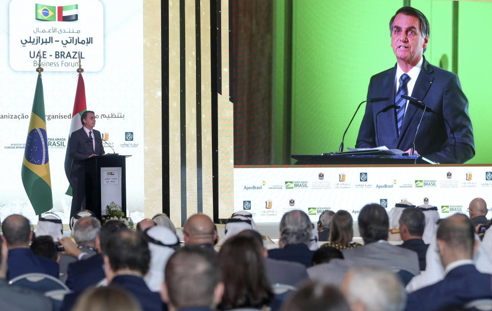 In this photo released by Emirates News Agency, WAM, Brazilian President Jair Bolsonaro talks during the Brazil-UAE Business Forum in Abu Dhabi, United Arab Emirates, Sunday, Oct. 27, 2019. (WAM via AP)