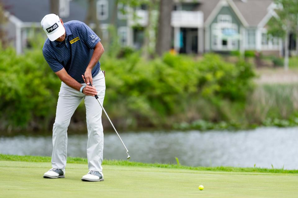 May 26, 2022; Benton Harbor, Michigan, USA; Chris Dimarco putts on the eighteenth green during the first round of the 2022 KitchenAid Senior PGA Championship at Harbor Shores. Mandatory Credit: Raj Mehta-USA TODAY Sports