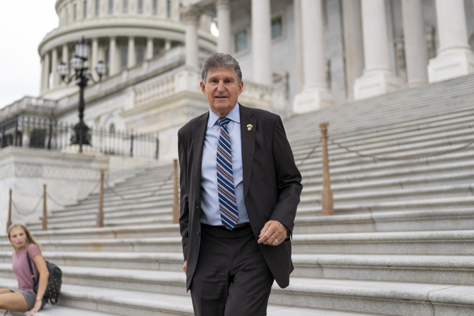 Sen. Joe Manchin, D-W.Va., takes a question from a reporter as the Senate breaks for the Memorial Day recess, at the Capitol in Washington, Thursday, May 26, 2022. A bipartisan group of senators is considering how Congress should respond to the horrific shooting of 19 children and two teachers in Uvalde, Texas (AP Photo/J. Scott Applewhite)