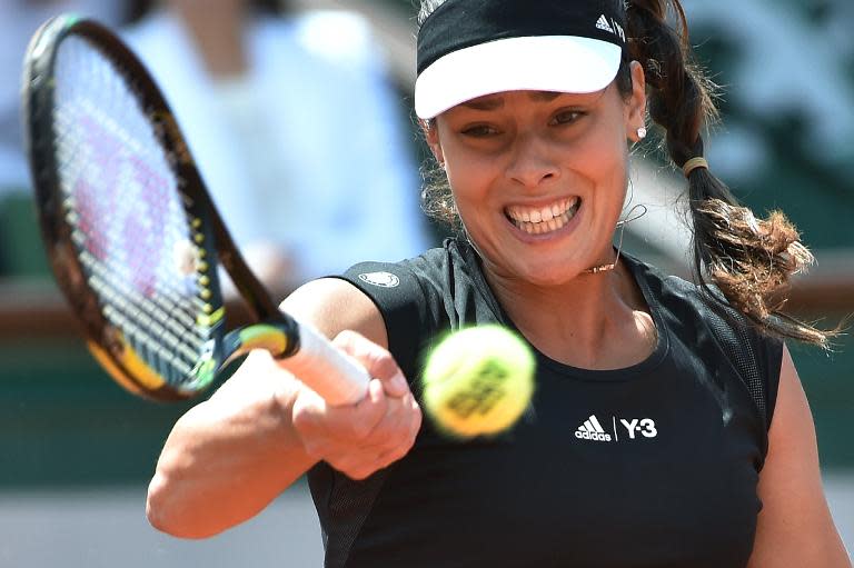 Serbia's Ana Ivanovic returns the ball to Ukraine's Elina Svitolina during the French Open in Paris on June 2, 2015