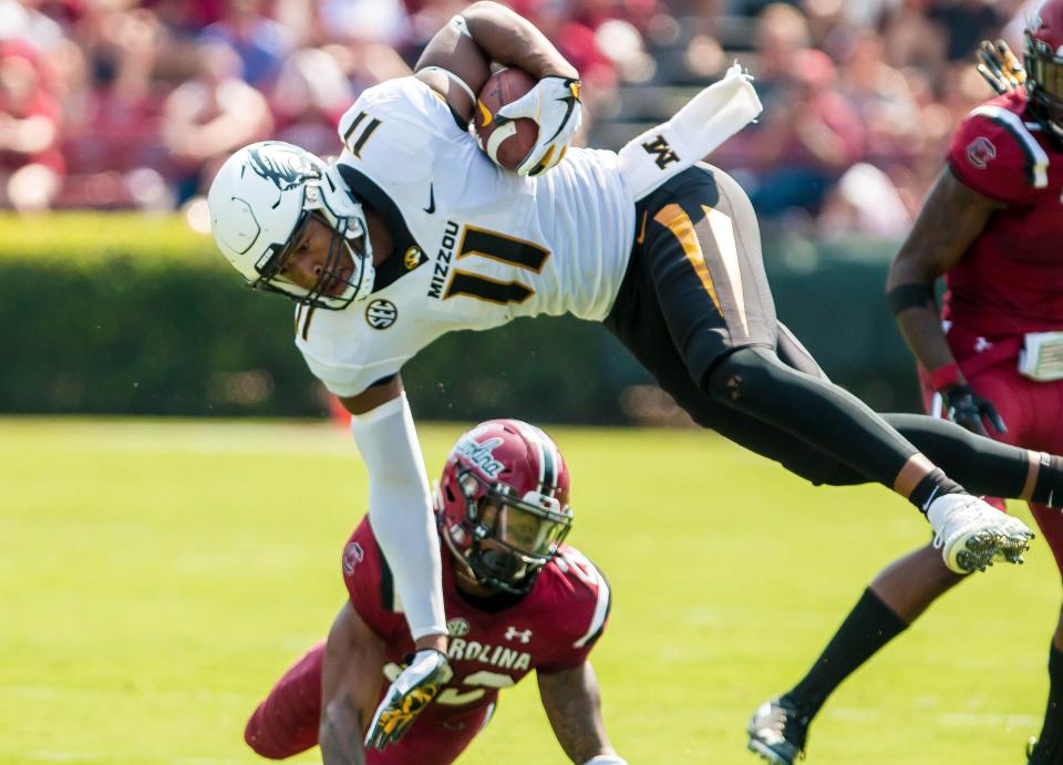 Oct 6, 2018; Columbia, SC, USA; Missouri Tigers tight end Kendall Blanton (11) is upended by South Carolina Gamecocks defensive back Steven Montac (22) in the first half at Williams-Brice Stadium. Mandatory Credit: Jeff Blake-USA TODAY Sports